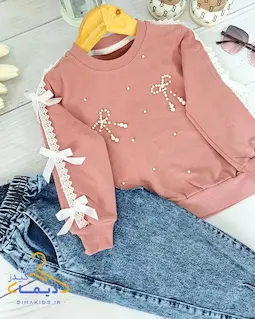 ست بلوز و شلوار جین کالباسی طرح پاپیون مرواریدی