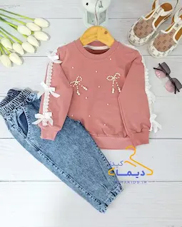 ست بلوز و شلوار جین کالباسی طرح پاپیون مرواریدی