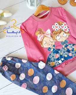 ست بلوز و شلوار صورتی طرح دختر دامن دار