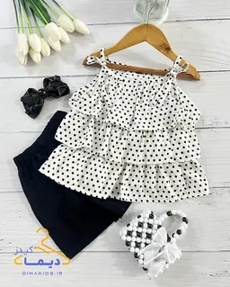 ست تاپ و شلوارک سفید طرح چین طبقه ای توپی مشکی 