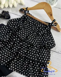 ست تاپ و شلوارک مشکی طرح چین طبقه ای توپی سفید