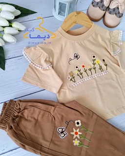 ست تیشرت و شلوار آستین چین دار کرم نسکافه ای طرح گلدار مینو 