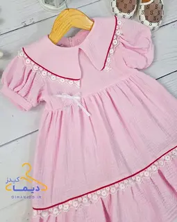 پیراهن آستین پفی صورتی پاستیلی طرح یقه خرگوشی