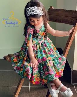 پیراهن چین دار سبز طرح دشت گلهای رنگی نیکی