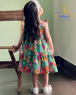 پیراهن چین دار سبز طرح دشت گلهای رنگی نیکی