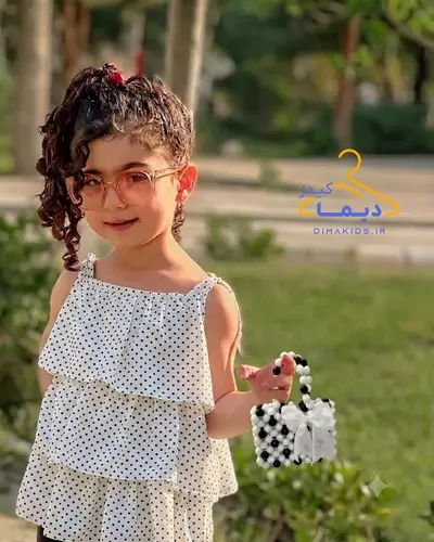 کیف دستی سفید مشکی طرح مرواریدی پاپیون سفید
